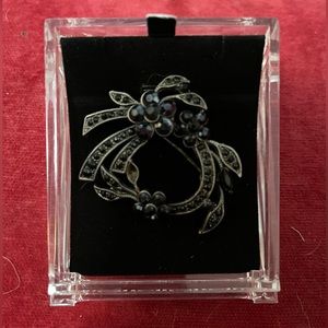 Mid century brooch. Silver tone with black rhinestones